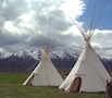 Tipis By Mountains